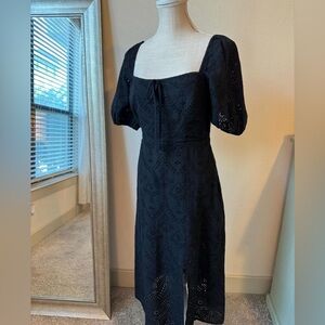 Black eyelet detail midi dress with puff sleeves and slit